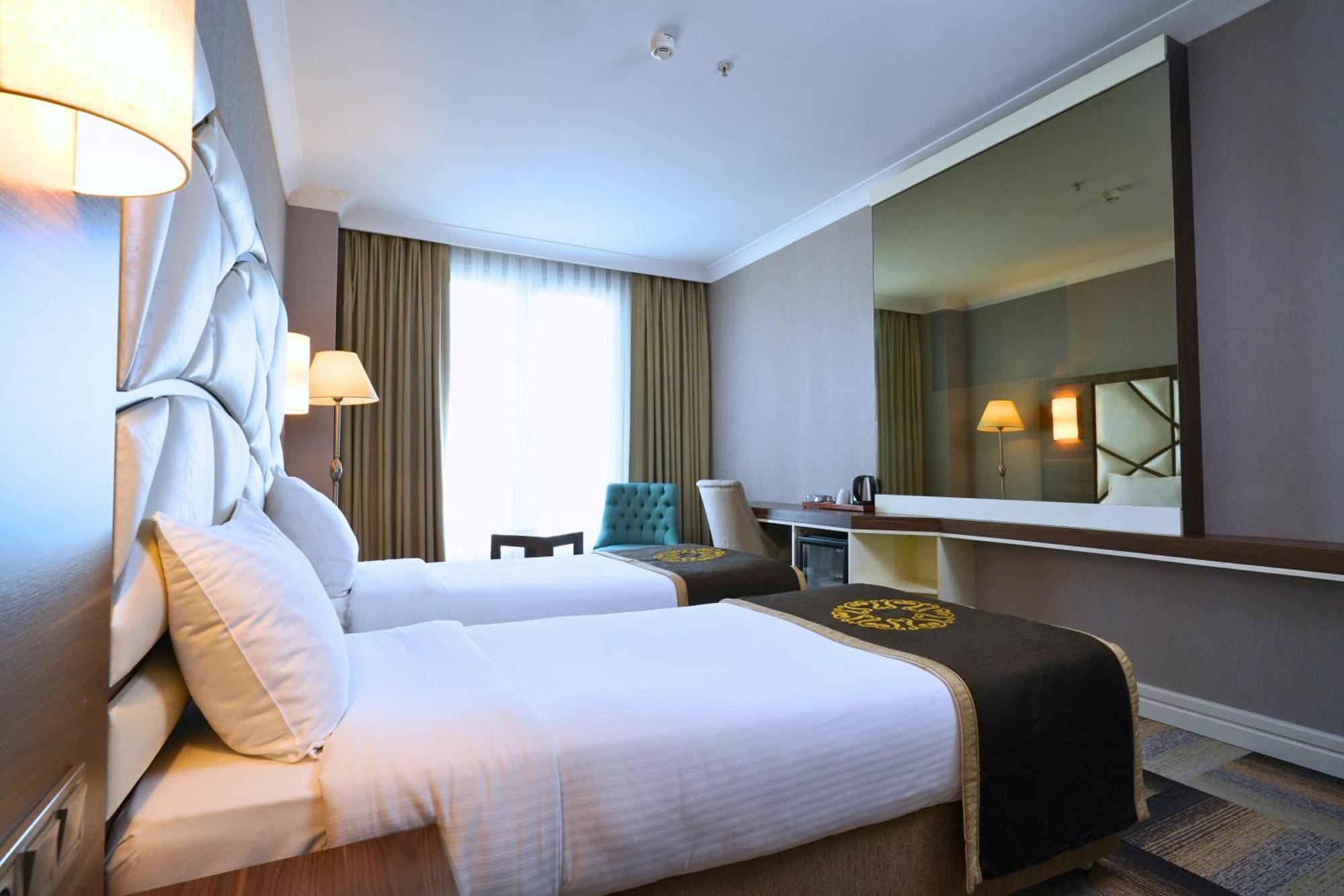 The Grand Mira Business Hotel — Fotos 1